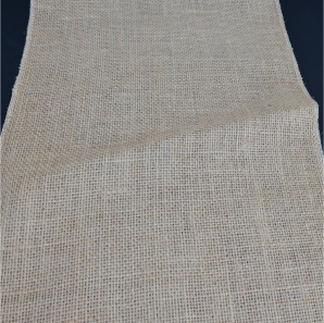 Close up of a burlap table runner.