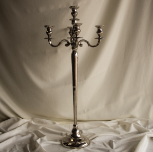 Close up of a candelabra with a white background.