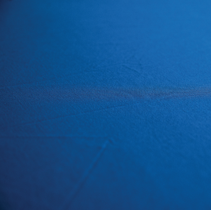Close up of an ocean blue spandex tablecloth.